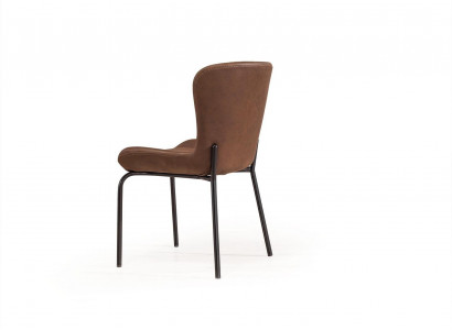 Brown leather chair, designer chair without armrests, dining room ambiance, new